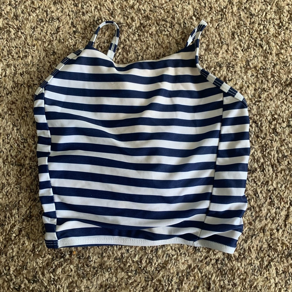 Worn before fits 11-14, cross ties in the back.